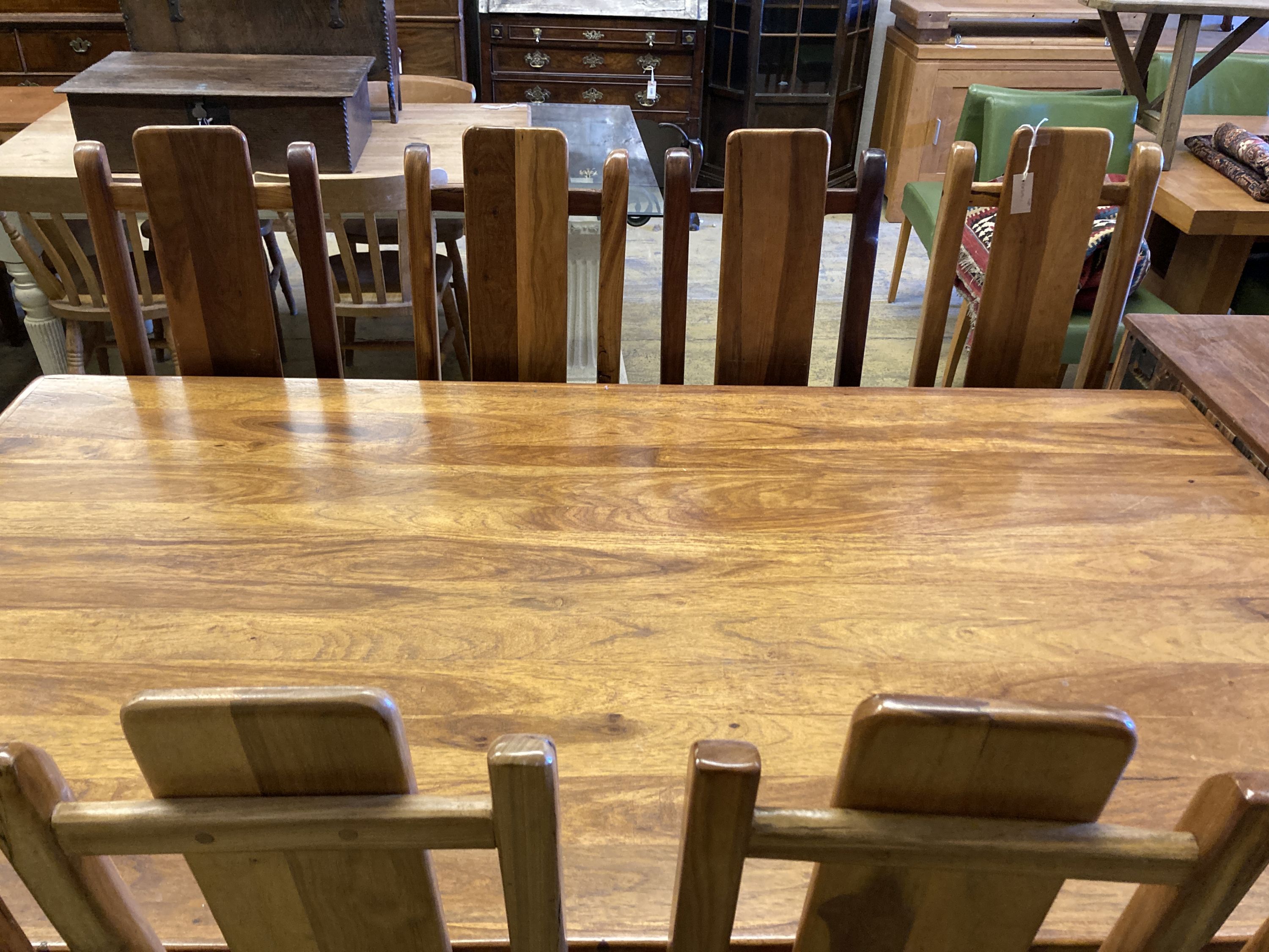 A hardwood suite, table length 200cm, depth 118cm, height 78cm